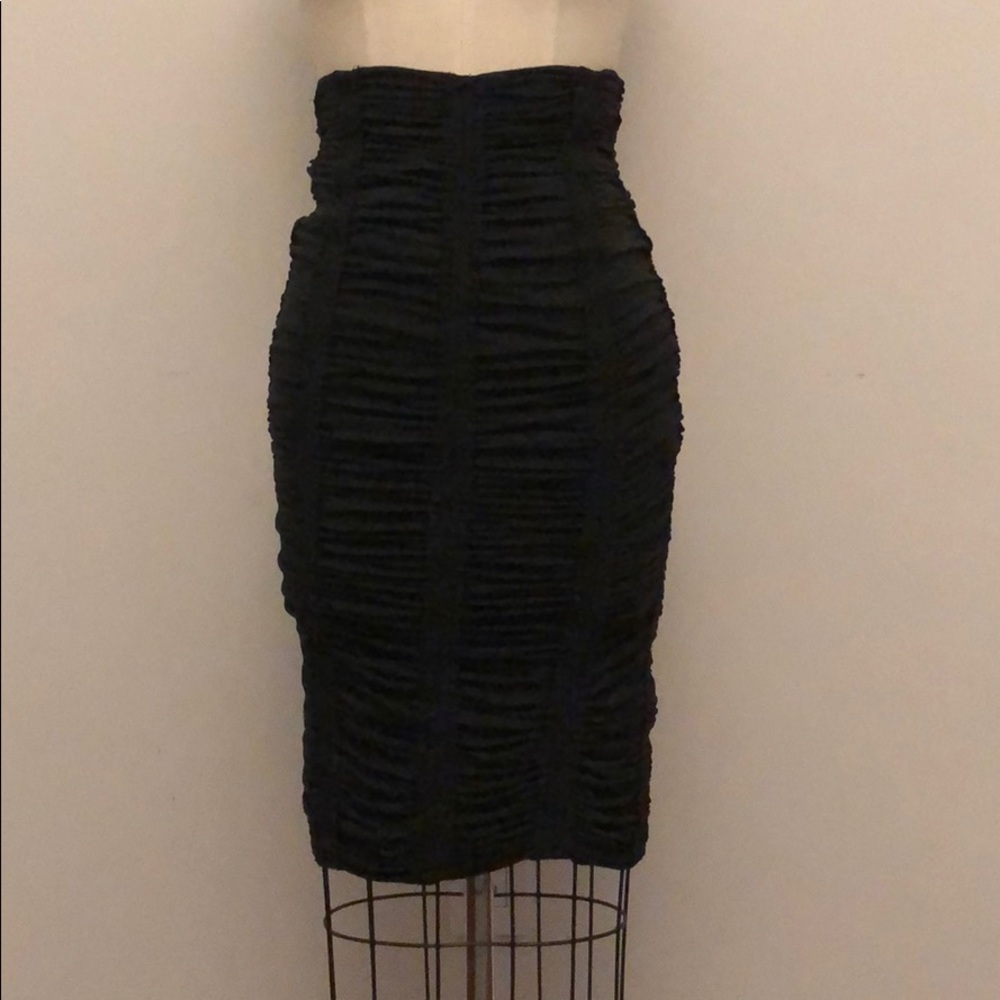 Tight fitted pencil skirt. Made in Italy